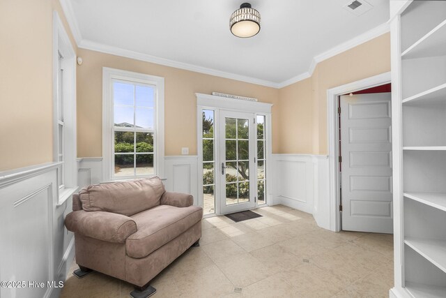 116 Salter Path Rd Unit 102Seabrook, Pine Knoll Shores, NC 28512 - entryway with ornamental molding, wainscoting, a decorative wall, and light tile patterned flooring