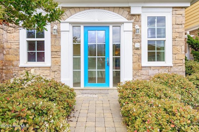 116 Salter Path Rd Unit 102Seabrook, Pine Knoll Shores, NC 28512 - property entrance featuring stone siding