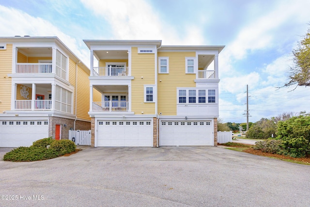116 Salter Path Rd Unit 102Seabrook, Pine Knoll Shores, NC 28512 - back of property featuring driveway and an attached garage