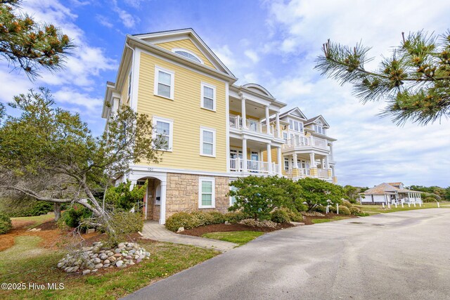 116 Salter Path Rd Unit 102Seabrook, Pine Knoll Shores, NC 28512 - view of front of house featuring stone siding