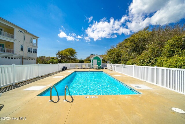 116 Salter Path Rd Unit 102Seabrook, Pine Knoll Shores, NC 28512 - community pool with fence and a patio area