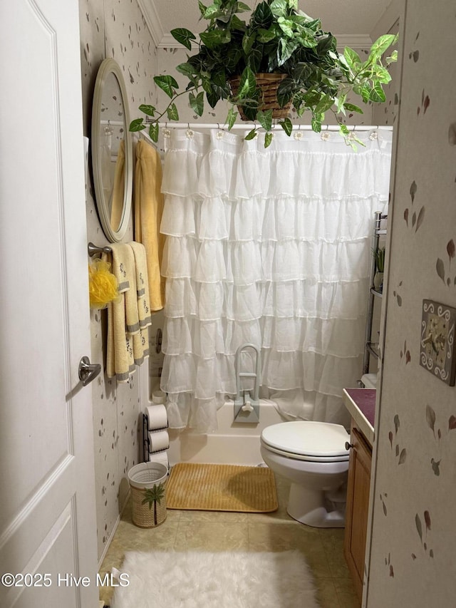 bathroom featuring wallpapered walls, toilet, vanity, and crown molding