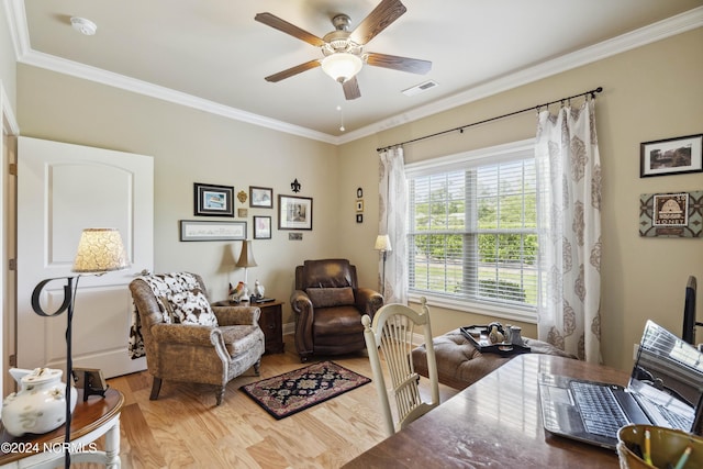 interior space with crown molding, ceiling fan, and wood-type flooring