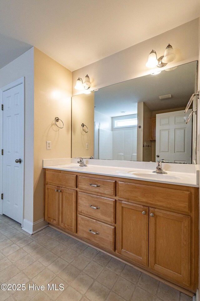 bathroom featuring baseboard heating, toilet, and walk in shower