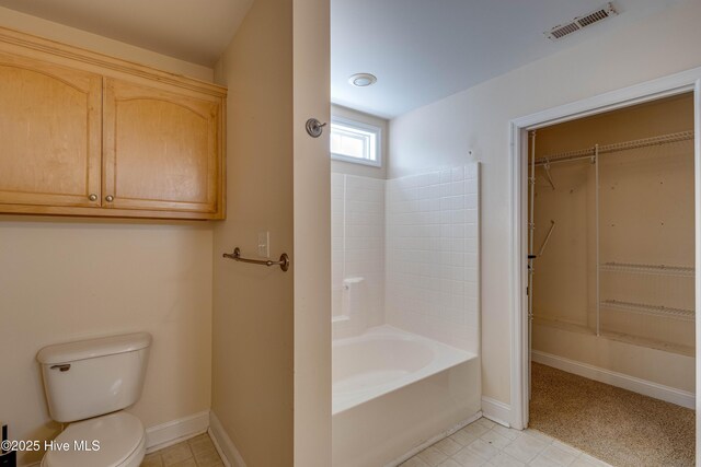 laundry area with cabinets and washing machine and clothes dryer