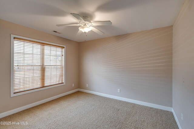 sunroom with plenty of natural light and ceiling fan