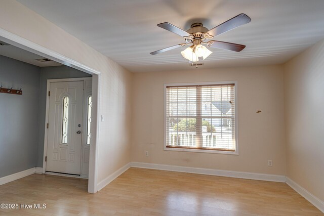 kitchen with light tile patterned flooring, stainless steel appliances, and vaulted ceiling