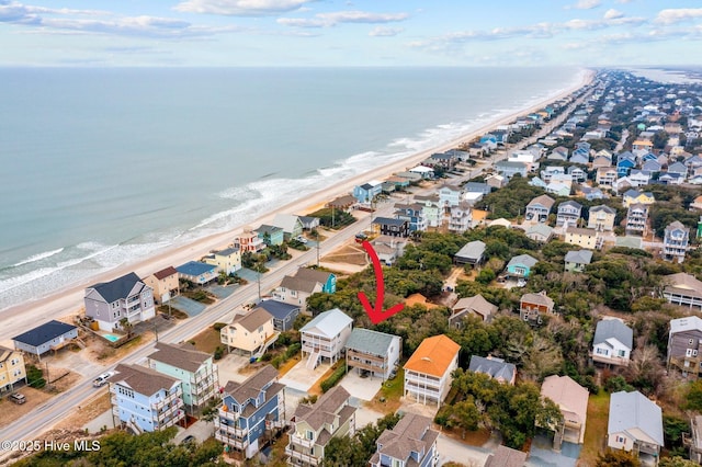 aerial view with a view of the beach and a water view