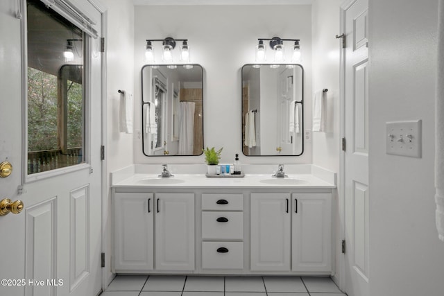 bathroom featuring vanity and tile patterned floors