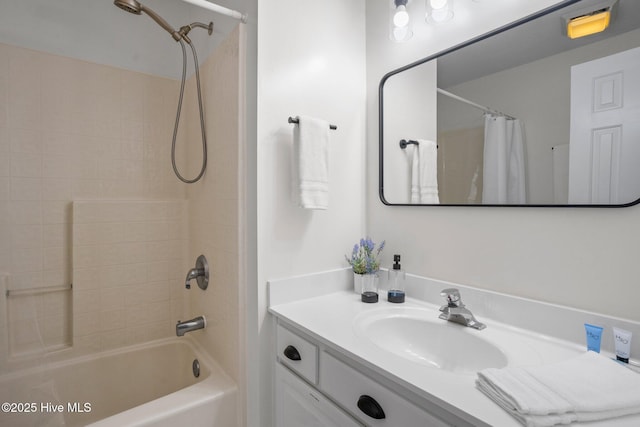 bathroom with shower / tub combo with curtain and vanity