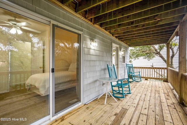 wooden terrace with ceiling fan