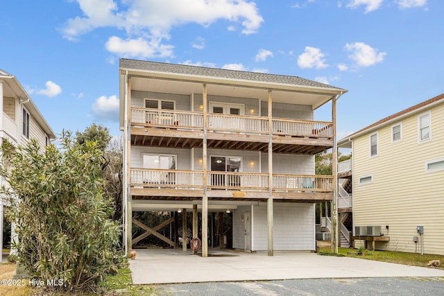 rear view of house with a carport