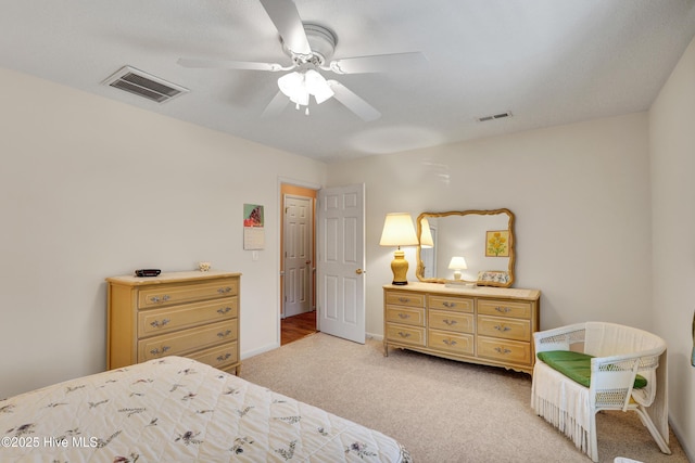 bedroom featuring ceiling fan and light colored carpet