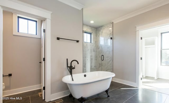 bathroom with separate shower and tub, toilet, and ornamental molding