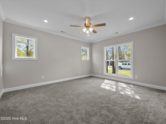 unfurnished room with crown molding, baseboards, and a ceiling fan