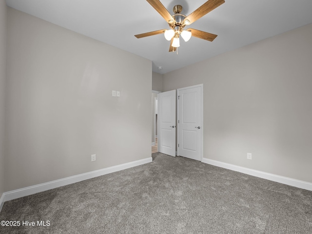 unfurnished bedroom featuring baseboards, carpet flooring, and ceiling fan