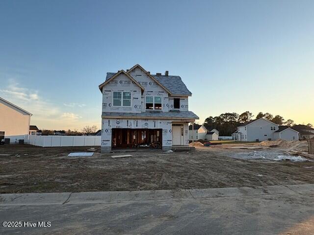 property under construction with a garage