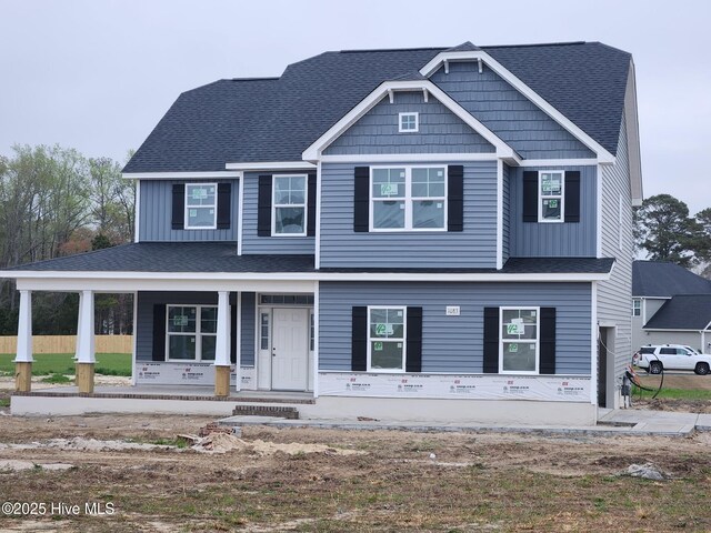 craftsman house with a front yard