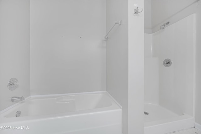 bathroom featuring walk in shower