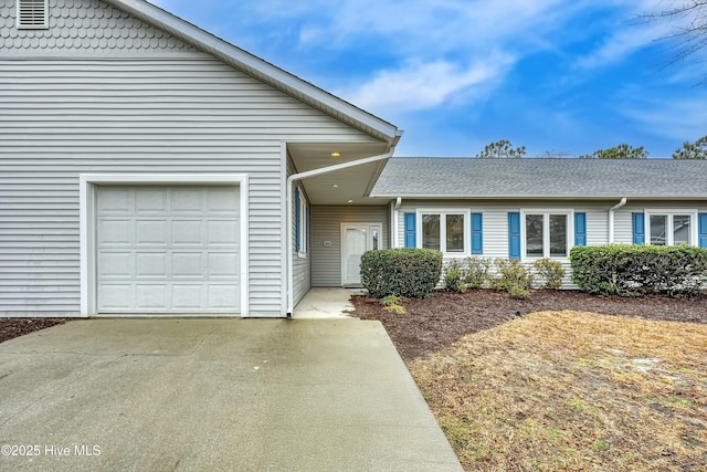 view of front of home with a garage