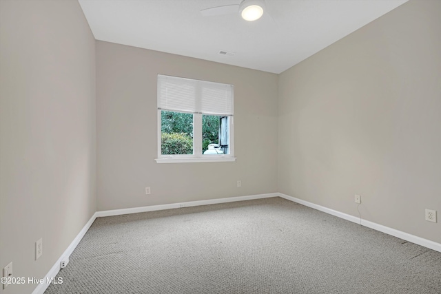 carpeted empty room with ceiling fan