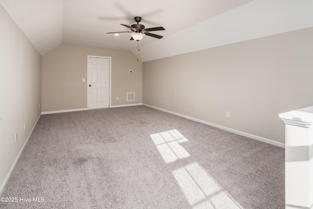 bonus room with ceiling fan, carpet, and vaulted ceiling