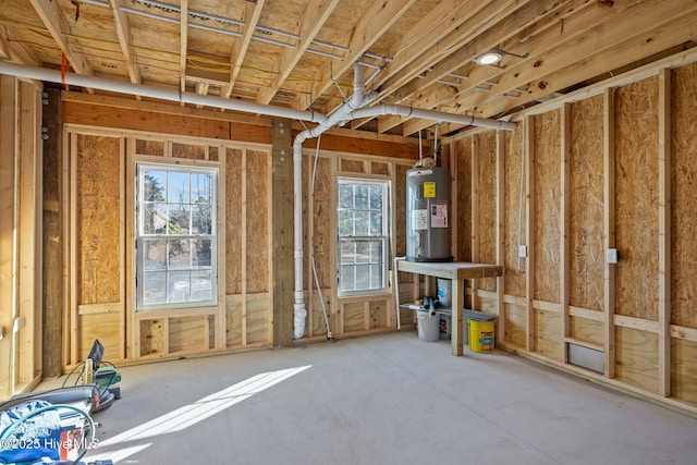 miscellaneous room featuring electric water heater