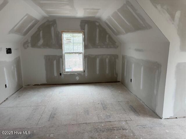 bonus room with vaulted ceiling