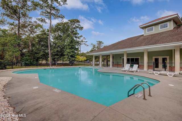 view of pool featuring a patio area