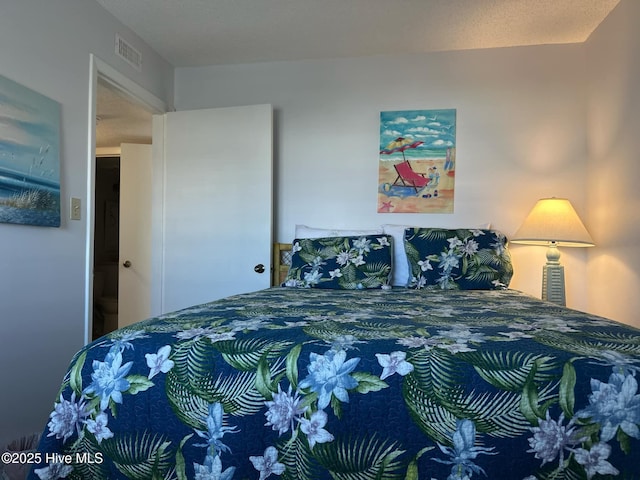 bedroom with a textured ceiling