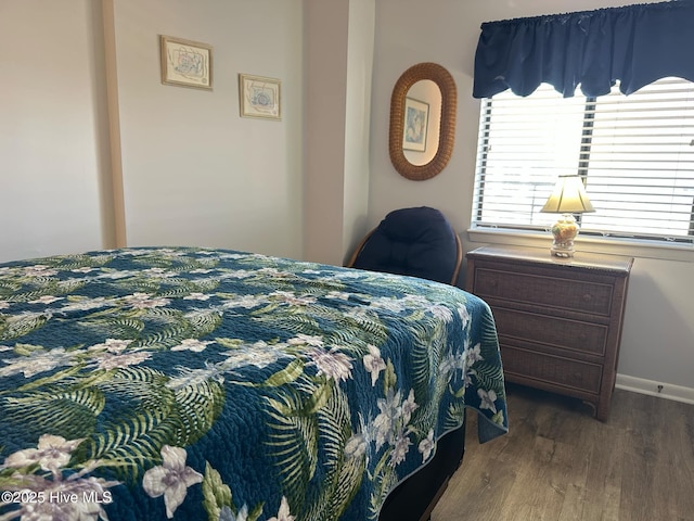 bedroom featuring dark hardwood / wood-style floors