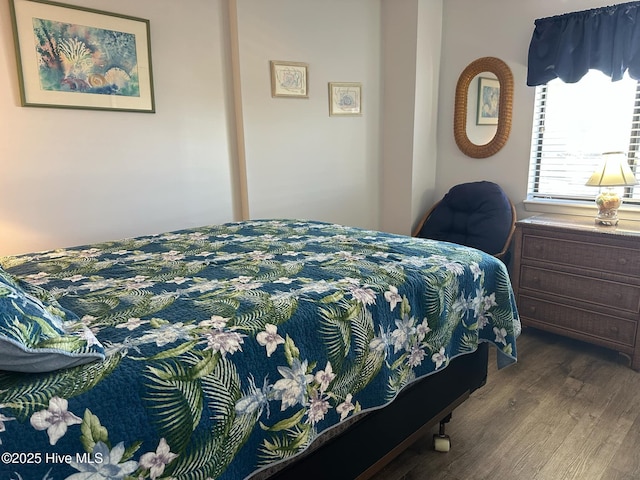 bedroom featuring hardwood / wood-style floors