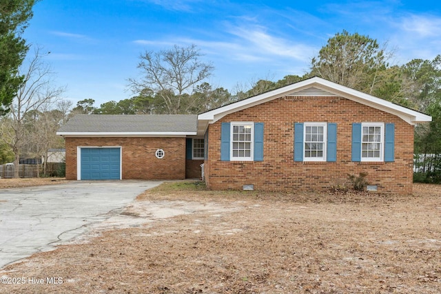 ranch-style house featuring a garage