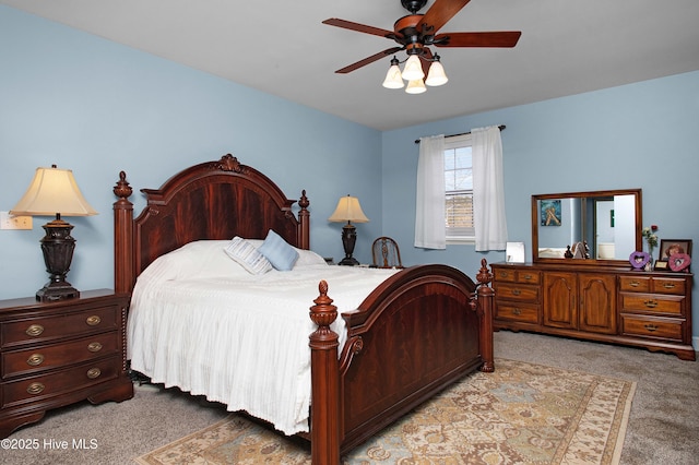 carpeted bedroom with ceiling fan