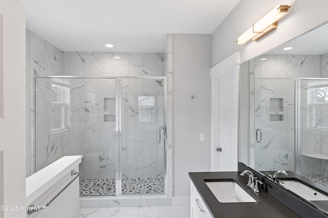 106 SE 36th St, Oak Island, NC 28465 - full bathroom with marble look tiles, vanity, a marble finish shower, and recessed lighting