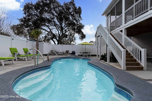 view of pool with a patio area