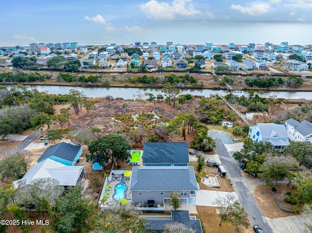 drone / aerial view featuring a water view