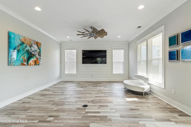 106 SE 36th St, Oak Island, NC 28465 - unfurnished living room with crown molding, recessed lighting, baseboards, wood finished floors, and a ceiling fan