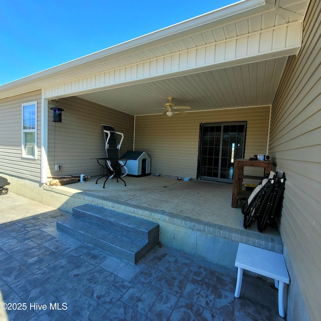 view of patio with ceiling fan