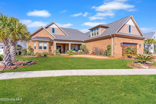 8383 S Shoreside Way NE, Leland, NC 28451 - craftsman inspired home with brick siding, a front lawn, roof with shingles, and an attached garage