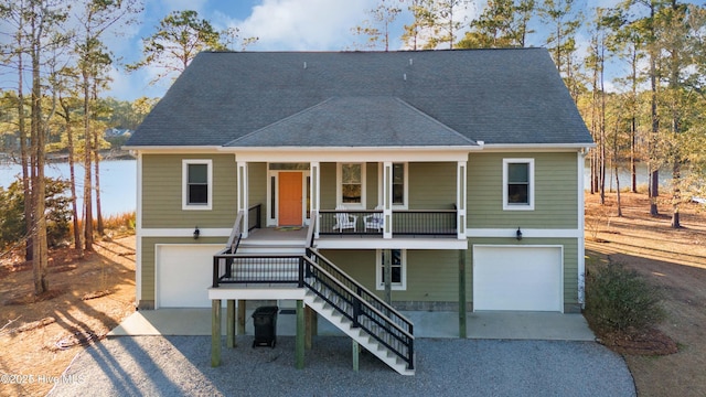 view of front of house with a garage and covered porch