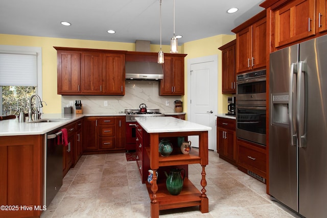 kitchen with exhaust hood, tasteful backsplash, sink, pendant lighting, and stainless steel appliances