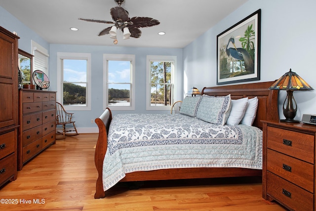 bedroom featuring ceiling fan and light wood-type flooring