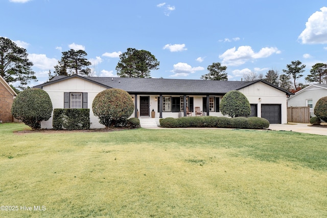 ranch-style home with a front yard and a garage