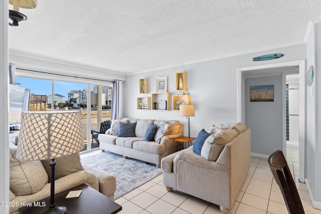 tiled living room with a textured ceiling and ornamental molding