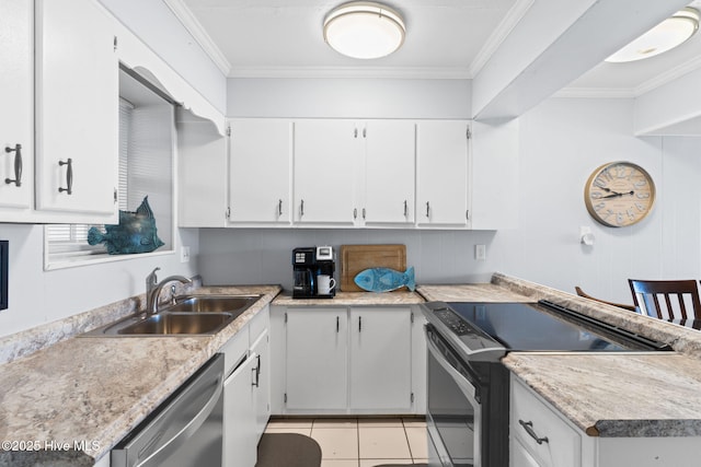 kitchen featuring white cabinetry, sink, stainless steel appliances, light tile patterned floors, and ornamental molding