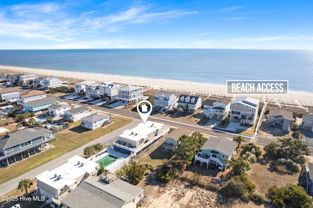 aerial view with a view of the beach and a water view