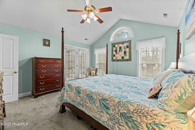 carpeted bedroom featuring ceiling fan, access to exterior, and vaulted ceiling