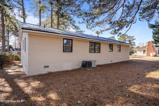 back of house with cooling unit