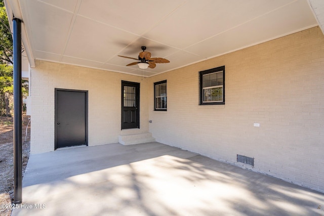 view of patio featuring ceiling fan